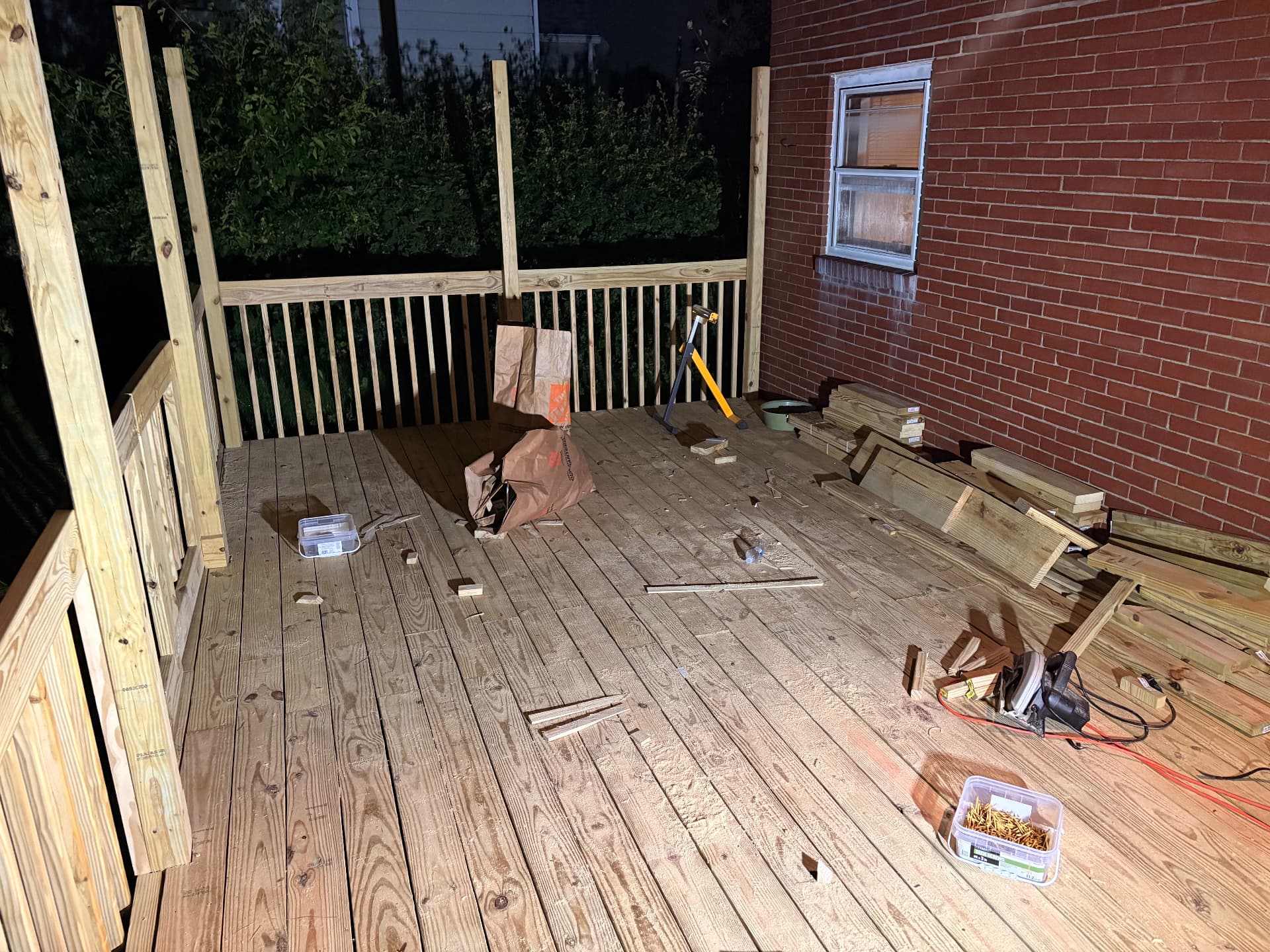 Deck railing and balusters being fitted along the edge